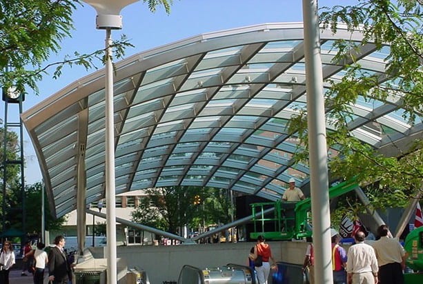 Architecturally exposed steel bends for transit canopy.