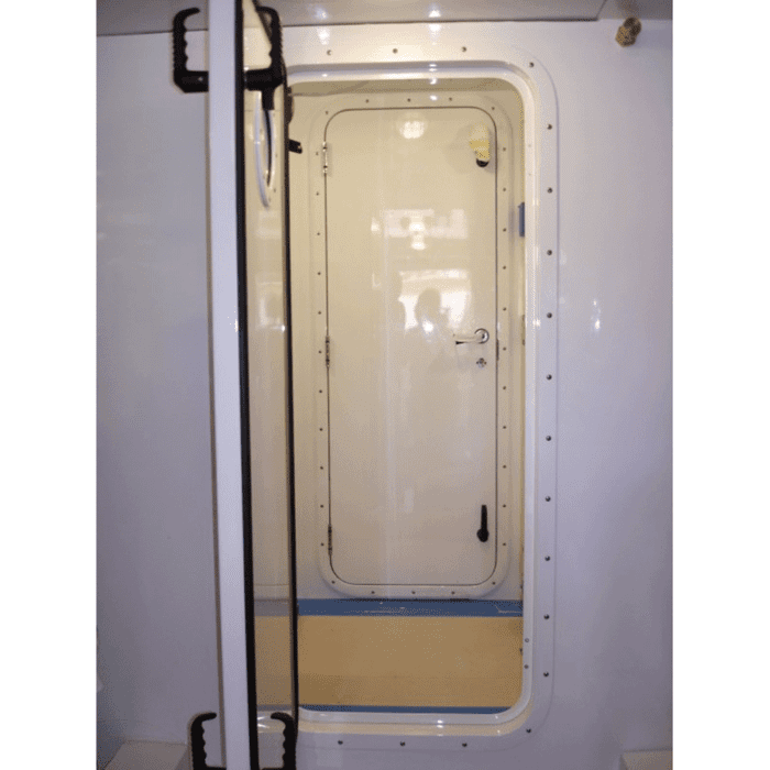 Pacific Coast Marine 1120 door installed on a ship.